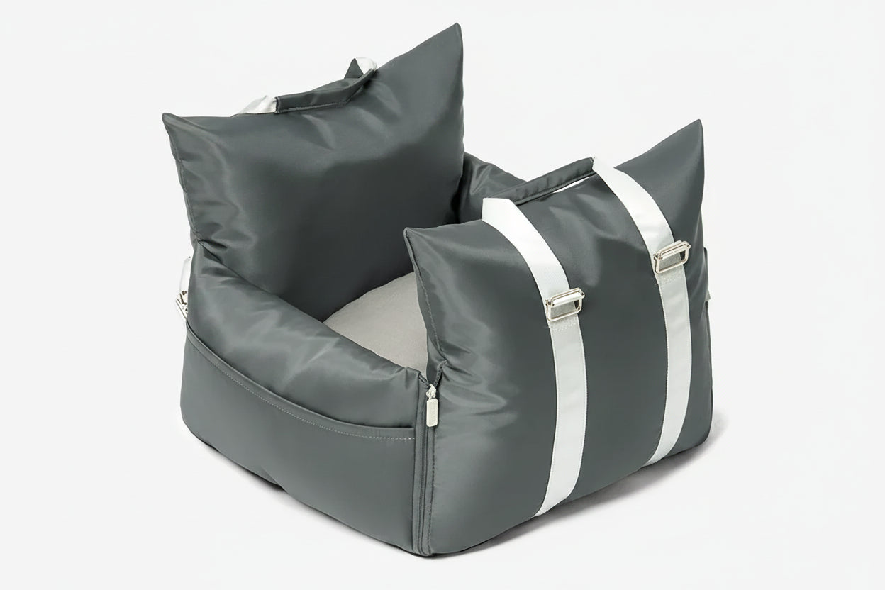 Gray pet bed with white stripes on a white background