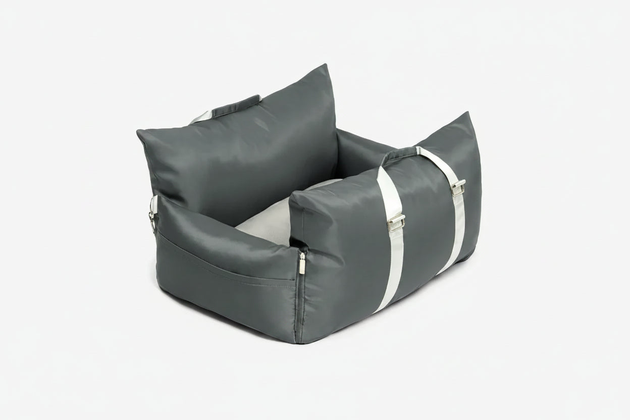 Gray inflatable seat with white straps on a white background