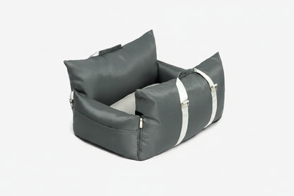Gray inflatable seat with white straps on a white background