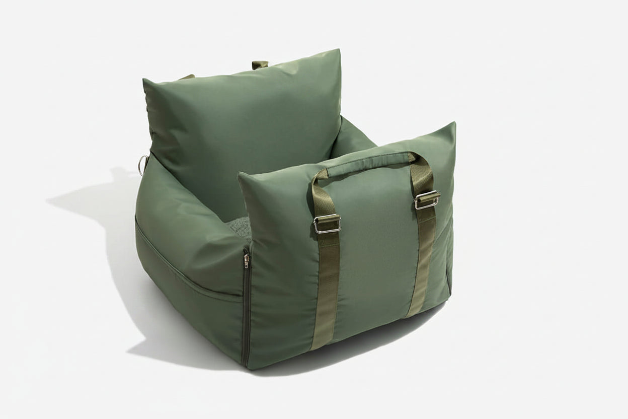 Green bean bag chair with straps on a white background