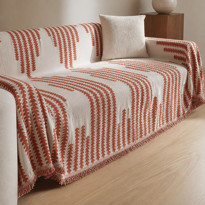 Chenille couch cover in living room, warm afternoon light, no animals