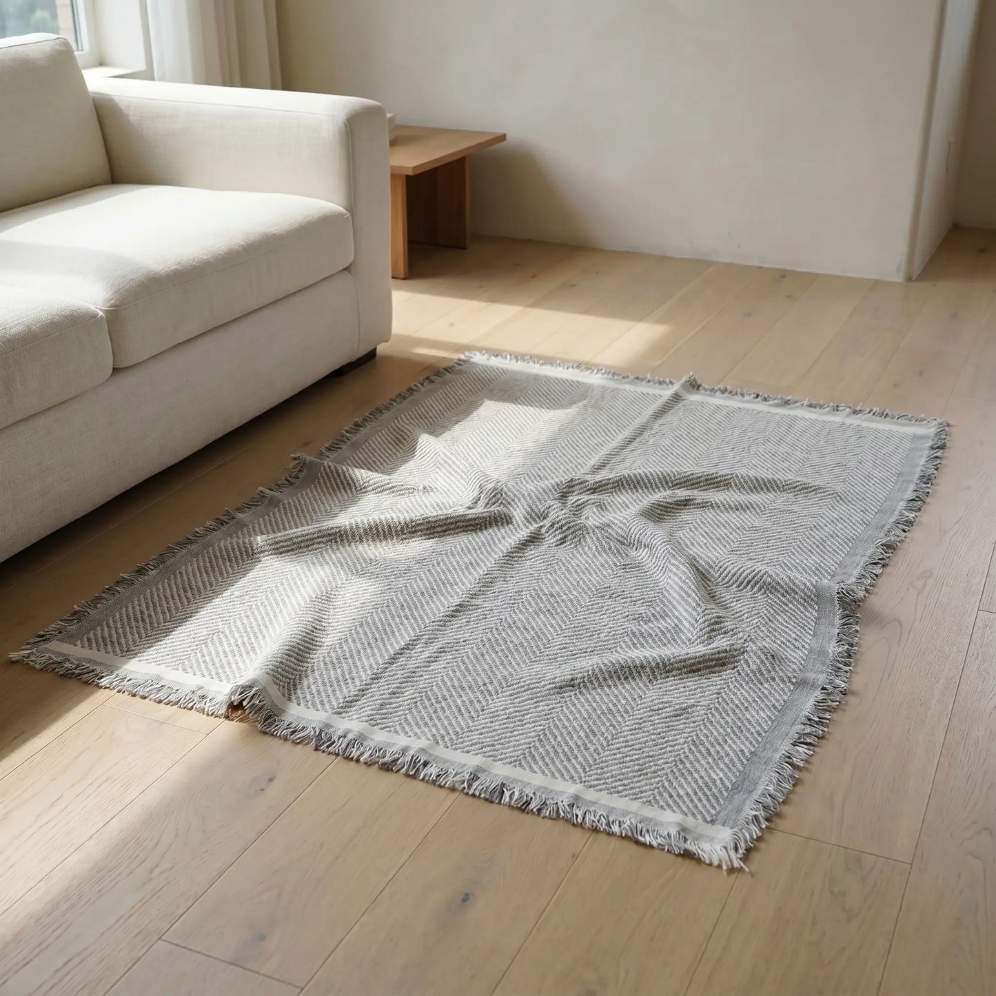 Gorse herringbone chenille throw in living room context