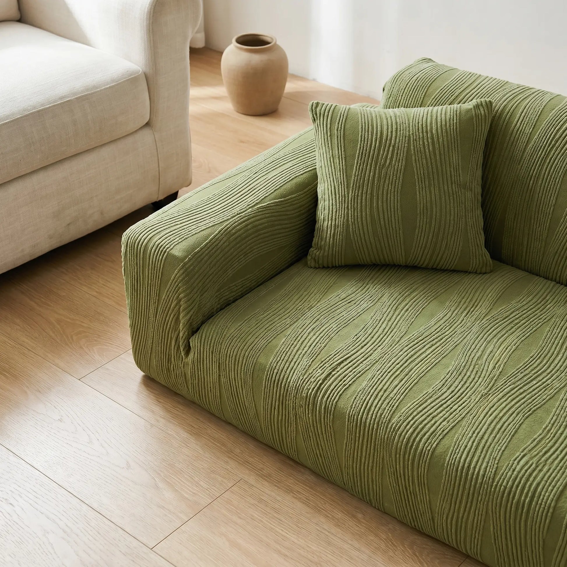 Hazel stretch sofa cover, studio shot