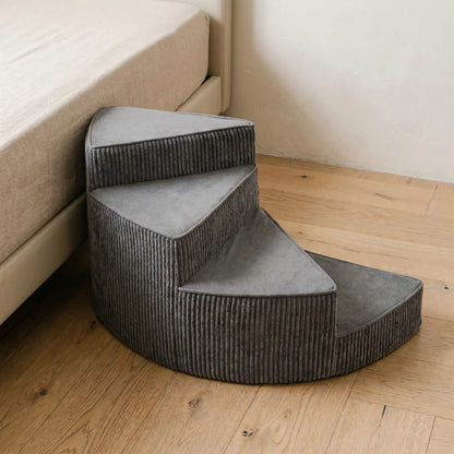 Reed corduroy pet stairs beside a bed